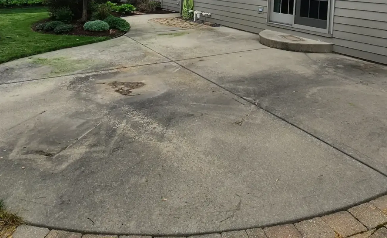 Photo of a concrete before pressure washing