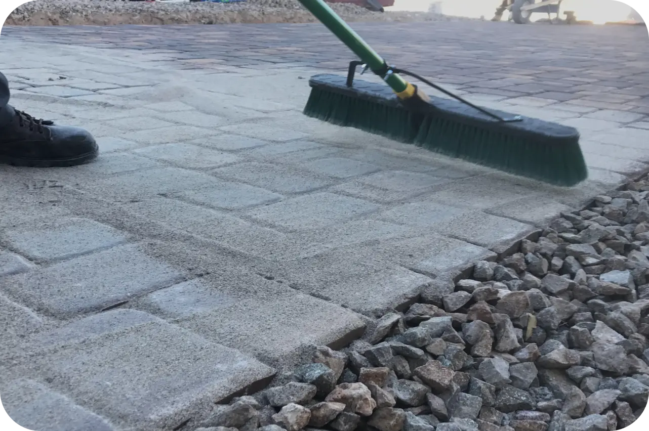 Photo of a paver sanding and sealing process