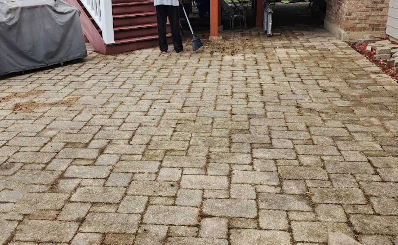 Photo of a paver before sanding and sealing