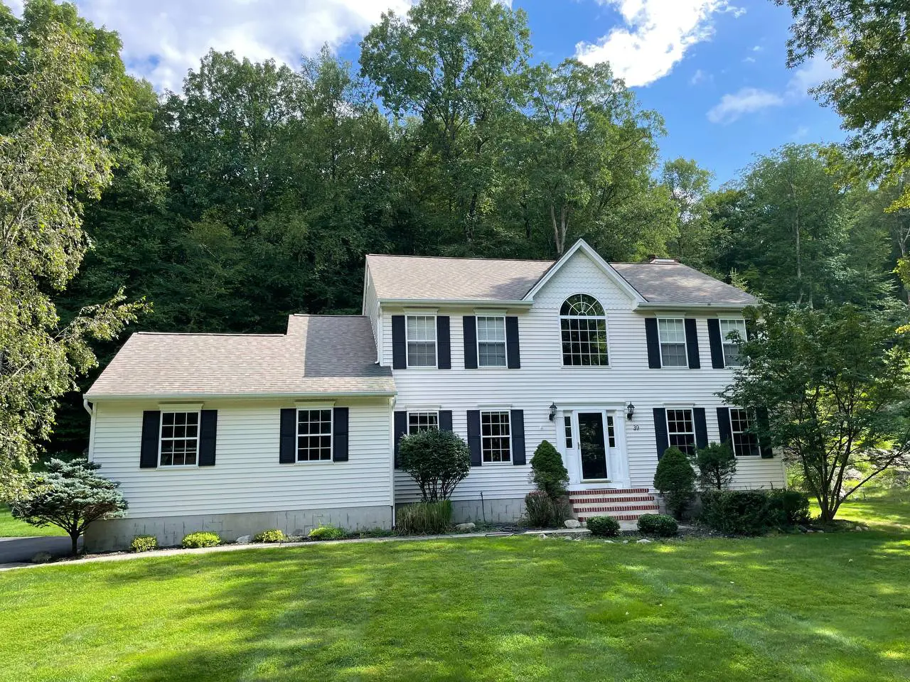 A house after roof soft washing