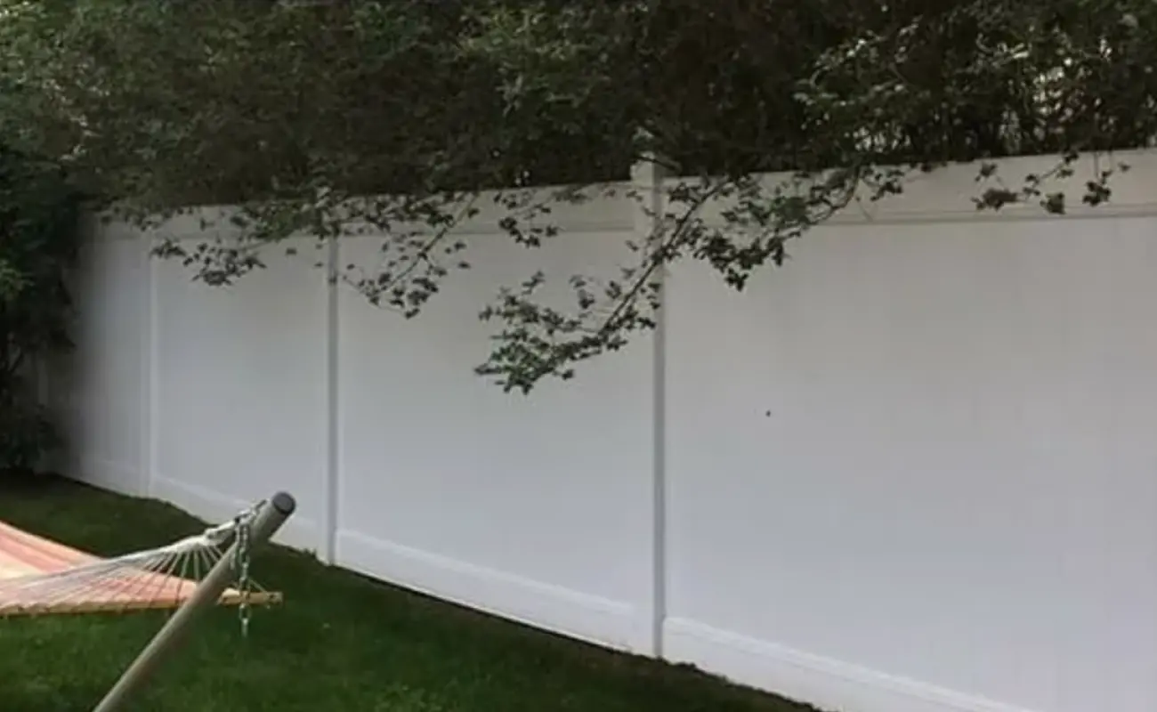 Photo of a vinyl fence after washing